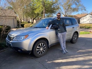 man helped by credit union auto loan