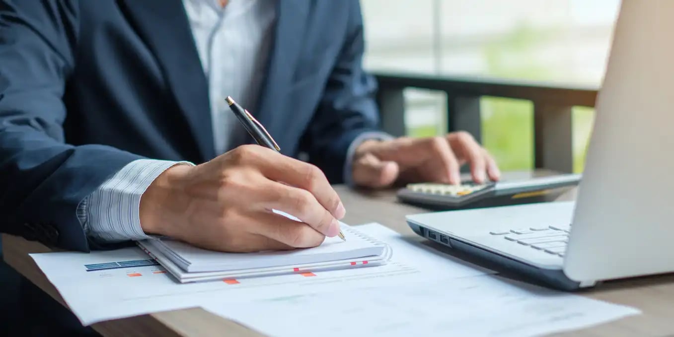 Cropped shot of a male accountant working with financial reports.