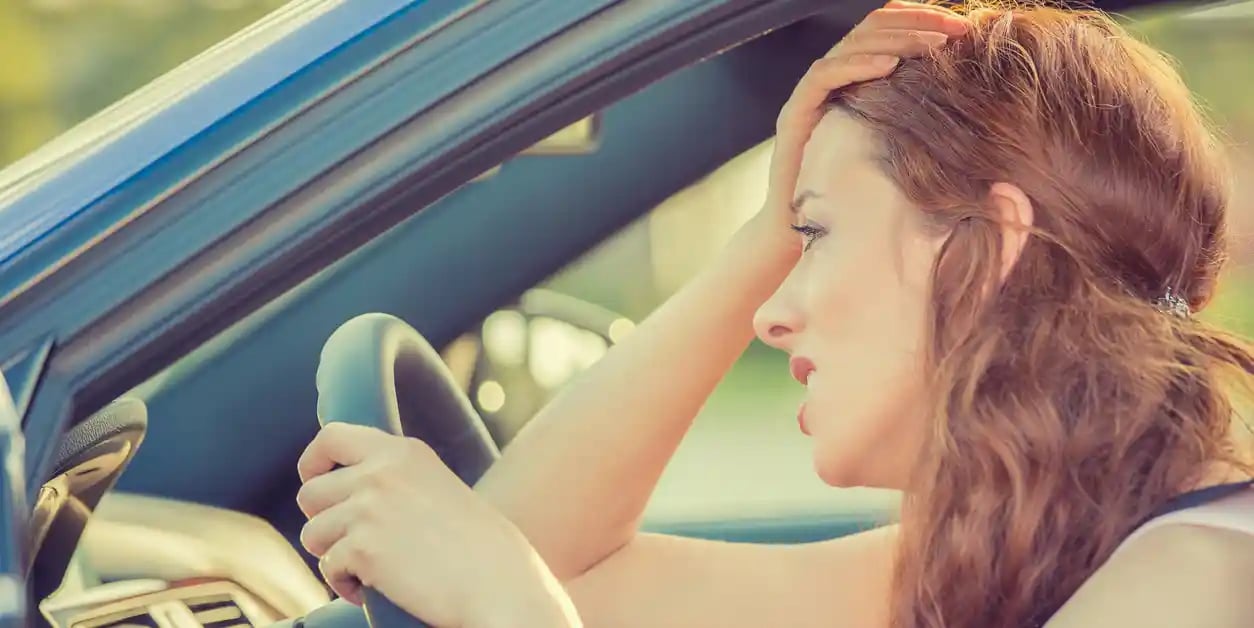 An angry woman should move closer to her new job to avoid road rage.
