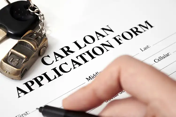 Taking an auto loan to purchase a new car.