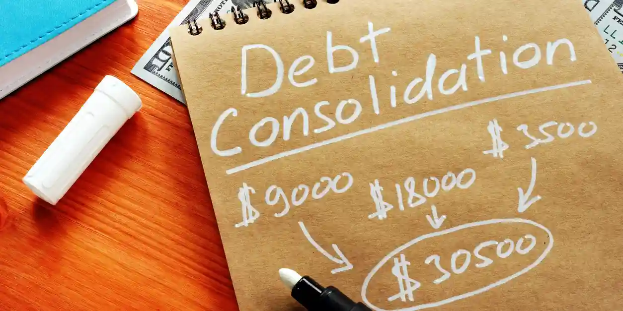 Debt consolidation tablet with written calculations. 